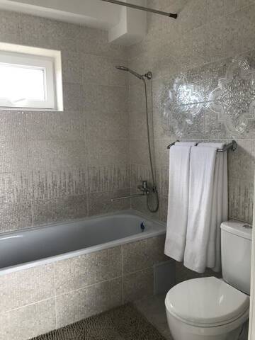 Фото номера Роскошный четырехместный номер Гостевой дом Guest House “Aura” г. Чолпон-Ата 13