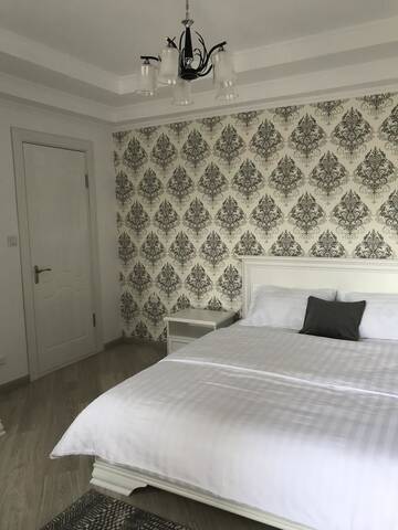 Фото номера Двухместный номер Делюкс с 1 кроватью и душем Гостевой дом Guest House “Aura” г. Чолпон-Ата 3