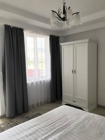 Фото номера Двухместный номер Делюкс с 1 кроватью и душем Гостевой дом Guest House “Aura” г. Чолпон-Ата 4