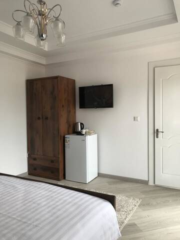 Фото номера Двухместный номер Делюкс с 1 кроватью и душем Гостевой дом Guest House “Aura” г. Чолпон-Ата 4