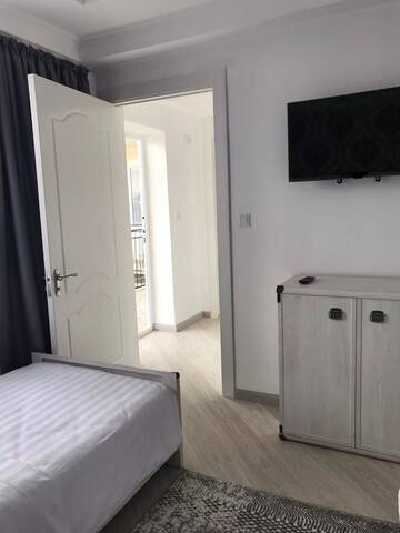 Фото номера Роскошный четырехместный номер Гостевой дом Guest House “Aura” г. Чолпон-Ата 9